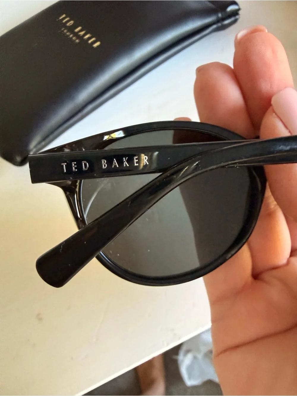 Ted Baker Black Round Sunglasses with Gold Logo Accents
